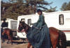 Ed's wife Colleen riding grandmother's side saddle, movie wardrobe duties